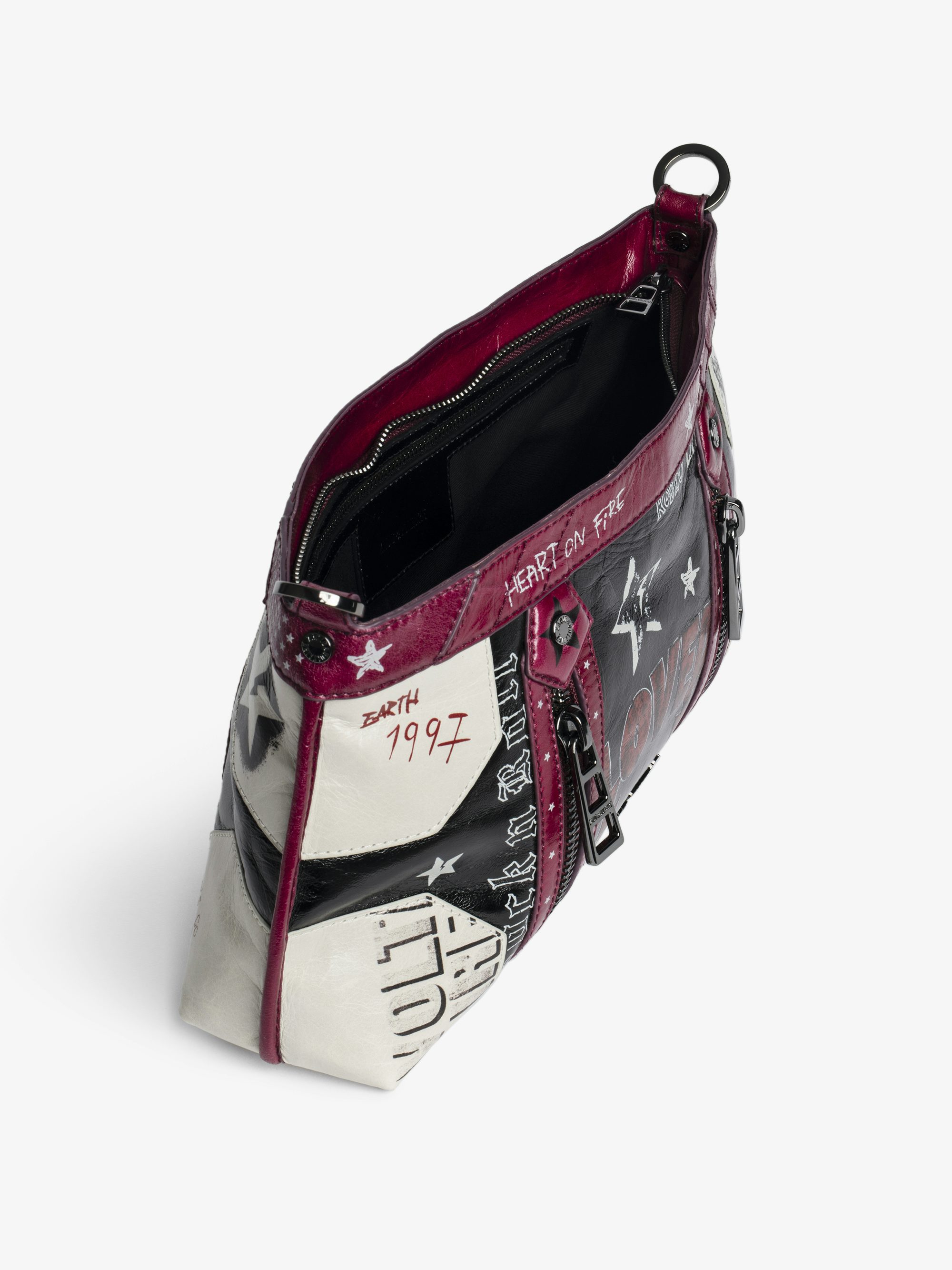 Sunny Moody Punk Bag - Vintage-inspired patent leather bag with adjustable shoulder strap and wing signature.